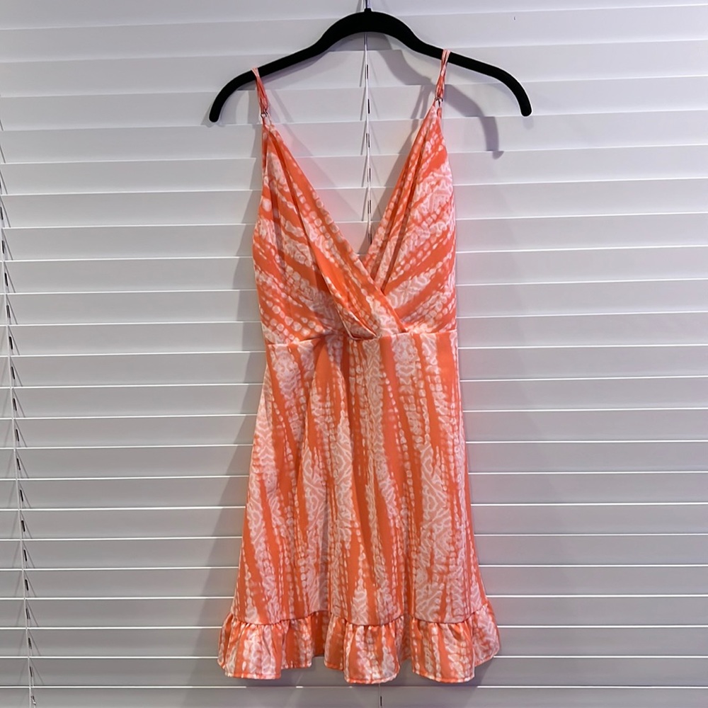 Dress from local boutique called Graffiti. Never worn in perfect condition.